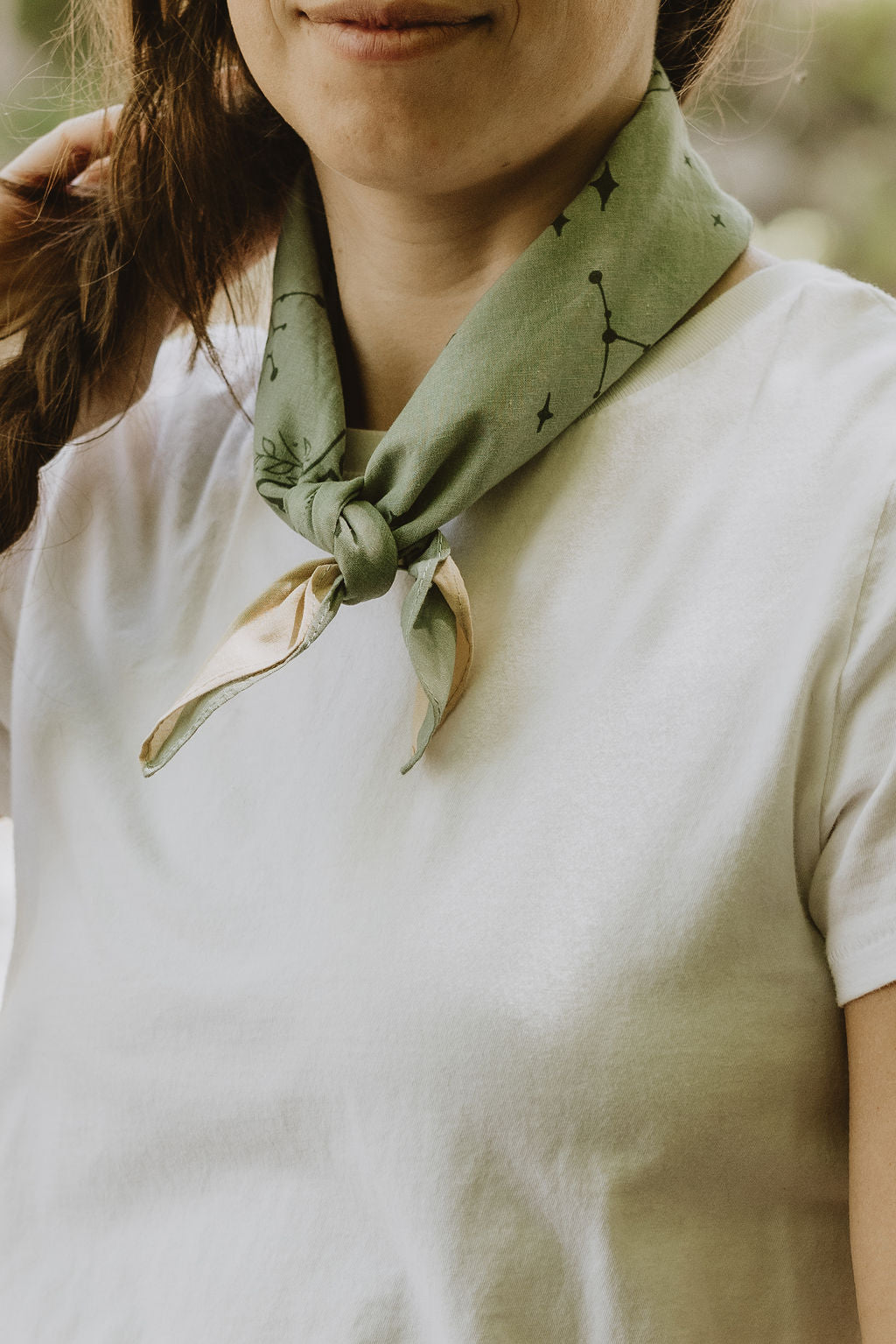 green star constellation bandana tied around neck with knot