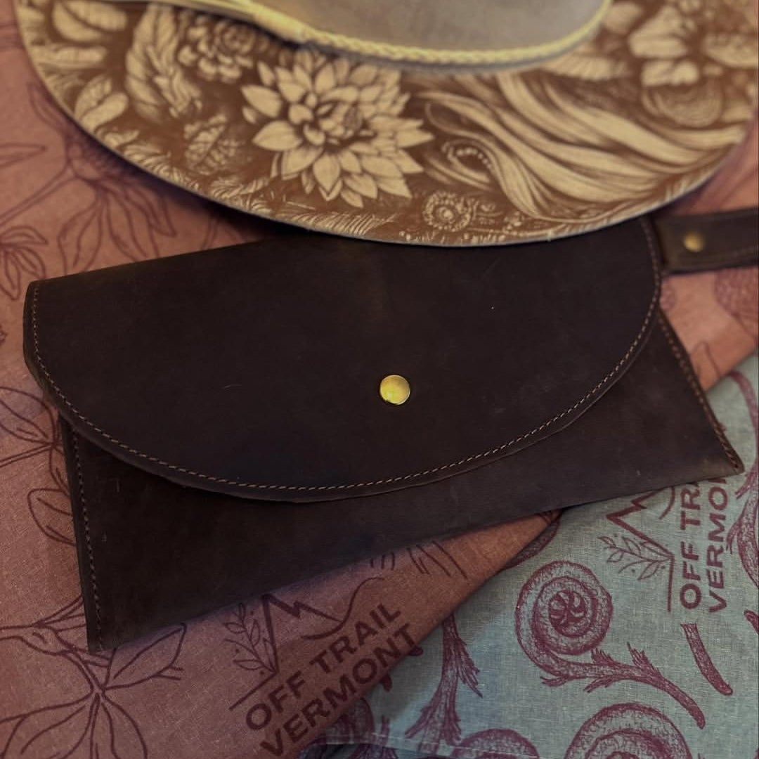 cowgirl leather, engraved hat and bandanas